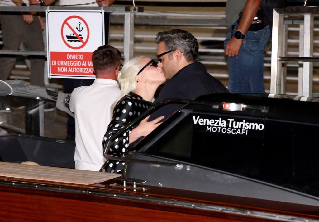 Lady Gaga flashes megawatt engagement ring as she and fiancé Michael Polansky arrive at Venice Film Festival